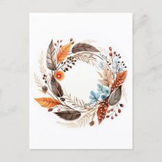 a card with an orange and blue wreath on it