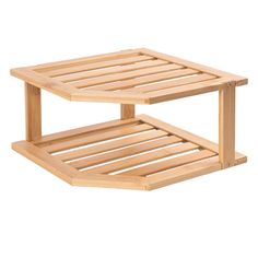 a wooden coffee table with two shelves on each side