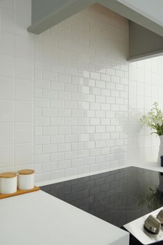 Polish your space with the American Olean 12-in x 12-in Starting Line white gloss brick mosaic ceramic wall tile. The durable high gloss finish makes this mosaic pop as a kitchen backsplash. Use it in your bathroom for a sleek, pristine look. American Olean Starting Line White Gloss 12-in x 12-in Glazed Ceramic Mosaic Wall Tile (0.83-sq. ft/ Piece) | SL1024BJHC1P2 White Subway Tiles Kitchen Backsplash, Brick Wall Tiles, Small White Kitchens, Brick Mosaic, Subway Tile Backsplash Kitchen, Brick Material, White Kitchen Tiles, Mosaic Ceramic, White Subway Tile Backsplash