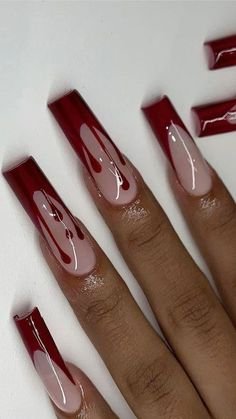 Try this chic and stylish nail art look for flawless nails! #NailArt #Beauty Baddie Nail Art Black And Red, Halloween Acrylic Nails Ideas, Dark Red Spooky Nails, Halloween Nails Tapered Square, Red And Black Spooky Nails, Blood Drip French Tip Nails, Halloween Nails Inspo Aesthetic, Red October Nails, French Tip Acrylic Nails Halloween