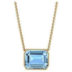 10.39 Carat Emerald cut Aquamarine in 18K Gold thin bezel Necklace Pendant The necklace length can be adjusted at 18" and 16" Custom options available upon order Aquamarine Necklace Pendant, Pear Pendant, Bezel Necklace, Aquamarine Pendant, Aquamarine Necklace, Jewelry Post, The Necklace, Aquamarine Jewelry, Necklace Length