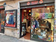 a store front with many items in the window