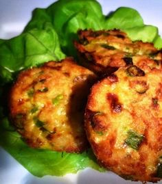 some food that is sitting on top of lettuce leaves and ready to be eaten