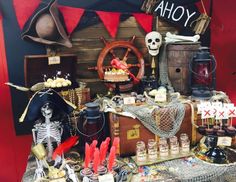 a table topped with lots of halloween items