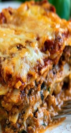 lasagna casserole on a plate with a fork