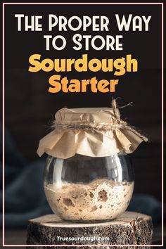 the proper way to store sourdough starter in a glass jar on top of a tree stump