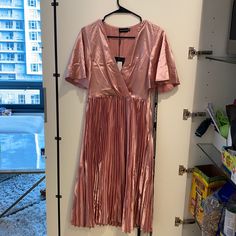 Brand New Plt Dress. Super Cute And Classy, Would Recommend Adding A Waist Belt. Uk 8, Us 4 , Eu 36 Pink V-neck Pleated Dress For Party, Pink Pleated Midi Dress For Night Out, Pleated Mini Dress With Short Sleeves For Night Out, Pink Pleated Dress For Day Out, Pink Pleated Dress For Night Out, Pleated Short Sleeve Dress For Night Out, Short Sleeve Pleated Dress For Night Out, Pink A-line Pleated Dress For Party, Casual V-neck Pleated Dress For Party