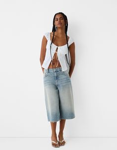 Baggy denim Bermuda shorts - New - Women | Bershka Jean Long Shorts, Relaxed Fit Wide Leg Jeans With Built-in Shorts, Summer Wide Leg Casual Jeans, Medium Wash Five Pocket Shorts For Summer, Trendy Relaxed Fit Cropped Jeans For Summer, Summer Denim Cropped Jeans For Streetwear, High Waist Medium Wash Cropped Jeans For Summer, Casual Medium Wash Bermuda Shorts For Summer, Summer Streetwear Cropped Jeans With Pockets