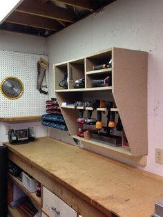 a workbench with lots of tools on it