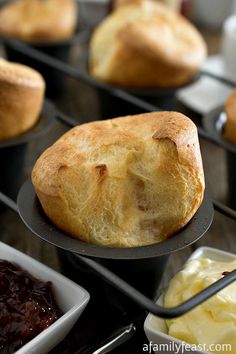 baked goods displayed in trays on display for purchase at bakery shop or restaurant, close up