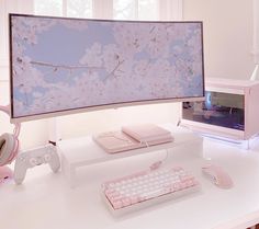 a desk with a keyboard, mouse and monitor on it