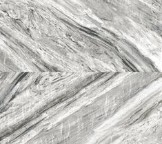 an abstract marble pattern with white and black streaks in the center, as well as dark grey lines on the edges