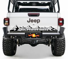 jeep gladiator decal on the back of a white truck