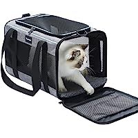 a cat sitting inside of a black and white bag with its head sticking out from it