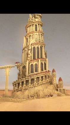 a very tall building sitting in the middle of a desert