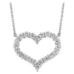 2.00 Carat Natural Diamond Heart Necklace Pendant G SI 14K White Gold 100% Natural Diamonds, Not Enhanced in any way Round Cut Diamond Necklace with 18'' chain 2.00CT G-H SI 14K White Gold Prong style 6.4 gram 13/16 inch in height, 15/16 inch in width 20 diamonds N5096W2 ALL OUR ITEMS ARE AVAILABLE TO BE ORDERED IN 14K WHITE, ROSE OR YELLOW GOLD UPON REQUEST. All Chains of Pendants and Necklaces Can be Requested in 16'' or 18'' Length. . This item is proudly handcrafted in the USA. Perfect gift on any occasion. This Item has passed highest quality inspections and has lifetime warranty on it. We want you to Wear it, Enjoy it, and Show it off! In case you are not 100% satisfied with this exquisite, elegant and lovely item we have a no hassle 30 day money back return policy. Please message ou Diamond Heart Necklace, Diamond Jewelry Store, Bezel Necklace, Gold G, Heart Necklace Diamond, Best Diamond, Bezel Diamond, Diamond Heart, Heart Pendant Necklace