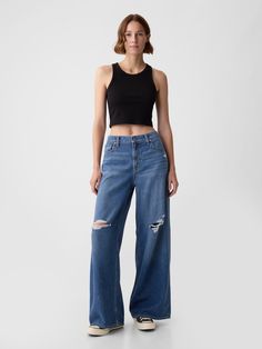 Fit:  A full-length, supersoft baggy jean that's fitted on the waist & relaxed all the way down.  ​ Fabric: 55% Cotton, 40% Tencel, 5% Recycled Cotton.  Stretch:  No Stretch Jeans.  Authentic denim that gets better with every wear.  Made to wear all day & break in over time.  ​​ Rise :  Mid Rise Jeans.  Look: A five-pocket baggy jean in a destroyed medium indigo wash.  ​ Details:  Zip fly, five-pocket styling, & destroyed details.  Responsibly Made: This pair of denim is part of our water-saving Baggy Jean, Jeans Look, Outfit Shopping, Curve Jeans, Crew Clothing, Water Saving, Swimwear Shorts, Newborn Dresses, Break In