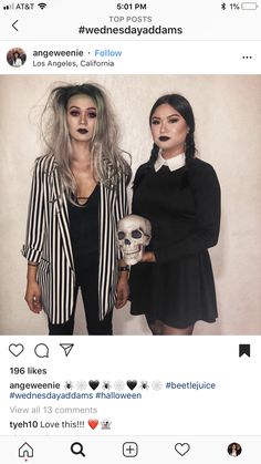 two women dressed up in halloween costumes posing for the camera, one holding a skull