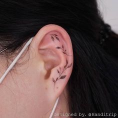 a woman with ear piercings on her ears