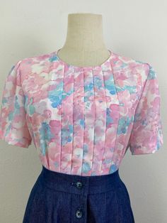 "Beautiful print!! Soft and confort. Perfect condition. Soft plated front body. 34\" to 38\" bust  15\" shoulder to shoulder  18\" arm pit" Vintage Pink Blouse With Floral Print, Vintage Multicolor Blouse With Vibrant Print, Pink Vintage Printed Blouse, Vintage Multicolor Spring T-shirt, Vintage Multicolor Floral Print Blouse, 80s Pastel, Spring Shorts, Pastel Floral, Womens Clothing Tops