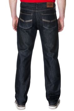 Experience the authentic look and feel of our carefully crafted modern, straight-leg men's jean with logo embroideries. Crafted from dark Indigo stone-washed premium denim with a subtle hint of tint, this premium jean is available in waist sizes 30/32/33/34/36/38. Perfect for building your contemporary wardrobe, these well-tailored jeans provide a versatile and vibrant base. Imported for your convenience. Features: Classic five-pocket styling 10.5" rise, 32" inseam, 17" leg opening* Zip fly, metal shank button at waist Genuine leather logo patch on back waistband Logo metallic thread embroideries on front and back pockets Available in Indigo Product Details: Material: 51% cotton/49% poly premium denim. Care Instructions: Machine wash cold, inside-out. Lay flat or hang to dry. Rockabilly Looks, Tailoring Jeans, Premium Denim Jeans, Indigo Jeans, Dark Indigo, Shirt Store, Leather Logo, Dark Wash Denim, Dark Wash Jeans