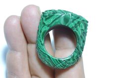 Buyer Will Receive 1 Piece Natural Malachite Full Carved Single Gemstone Made Ring.you will really love it.you will gift it to your love ones and friends. Product Details Product Name - Natural Malachite Full Carved Single Gemstone Made Ring. Gemstone - Natural Malachite Quantity - 1 Piece 100% Natural ----------------------------------------------------------------------------- THIS BEAUTIFUL ITEM IS AVAILABLE ONLY ON ETSY ------------------------------------------------------------------------ Green Carved Rings For Anniversary, Green Carved Rings Perfect For Gifts, Luxury Green Crystal Ring With Gemstone, Malachite Gemstone Ring, Green Malachite Rings For Anniversary, Handmade Malachite Ring Jewelry, Handmade Malachite Ring, Green Malachite Rings As A Gift, Malachite Rings Gift