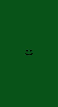 a green square with a smiley face drawn on it