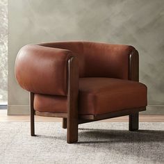 a brown leather chair sitting on top of a carpeted floor next to a window