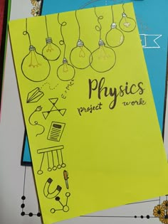 there is a yellow piece of paper with drawings on it that says physics project work