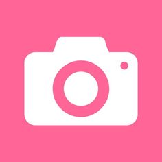 a pink and white camera on a pink background