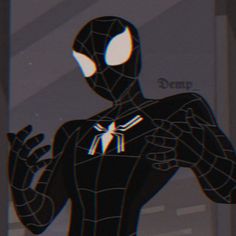 a spider man standing in front of a window with his hands out to the side