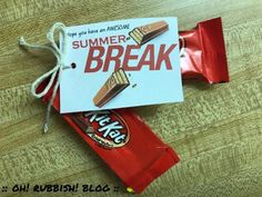 a snack bar wrapped in red paper and tied up to a sign that says summer break