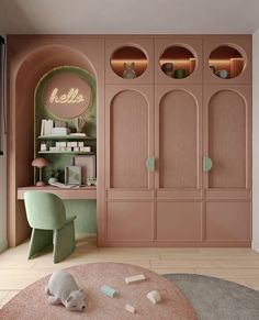 a living room with pink walls and green furniture in the corner, along with a round rug on the floor