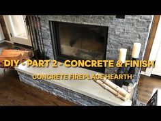 a fireplace that has some candles on it and the words diy part 2 concrete & finish