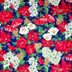 a blue background with red and white poinsettis, pine cones and snowflakes