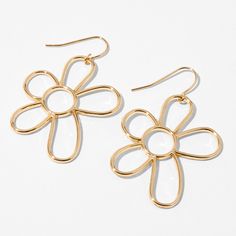 Give yourself flowers with these beautiful drop earrings. They have cutout daisy designs in a classic gold-tone. Finish: Gold-tone Drop: 1" Closure: Fish hook Material: Metal - Claire's Gold Daisy Outline 1" Drop Earrings Trendy Hoop Earrings With Flower Charm For Spring, Trendy Metal Flower Shaped Earrings, Trendy Metal Flower Earrings, Trendy Metal Flower-shaped Earrings, Gold Flower Charm Earrings For Summer, Spring Flower Pierced Earrings, Trendy Gold Flower-shaped Jewelry, Gold Metal Jewelry For Spring, Gold Flower Earrings For Pierced Ears, Summer Season