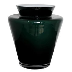 a black vase is shown on a white background