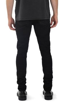 A sleek dark wash lends wear-anywhere versatility to these lean and leggy skinny jeans cut from lightweight stretch denim. 98% cotton, 2% Lycra® spandex Machine wash, line dry Imported Asian Founded Fitted Jeans For Everyday Wear, Modern Black Stretch Jeans, Black Slim Fit Jeans For Everyday, Black Resin, Resin Coating, Stretch Denim, Black Jeans, Sleek, Nordstrom