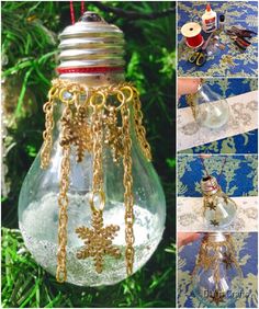 an ornament hanging from a christmas tree with chains attached to the light bulb