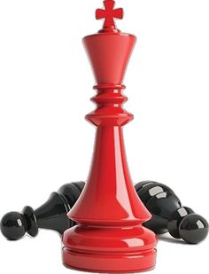 a red and black chess piece laying on top of it's side, with one pawn facing the other