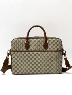 The Interlocking G has remained one of the most symbolic codes of the House since its introduction. The distinguishing emblem appears as a leather detail atop this business case. Completing the design's logo feel, the style is crafted from monogram canvas. G Man, Business Case, Leather Detail, Handbag Wallet, Timeless Handbag, Luxe Fashion, Bags Designer Fashion, Gucci Men, Exclusive Bag