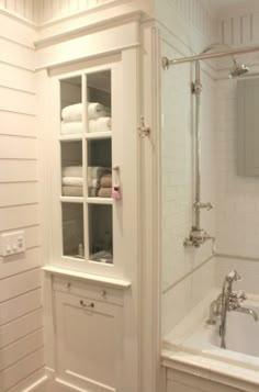 a bathroom with white walls and flooring