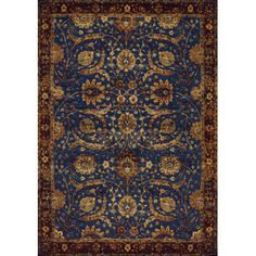 a blue rug with an ornate design on the front and back side, in gold accents