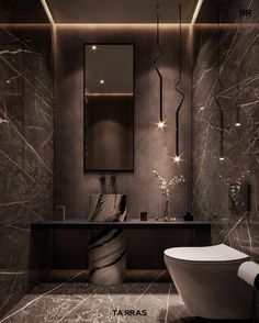 an elegant bathroom with marble walls and flooring is featured in the magazine tarras