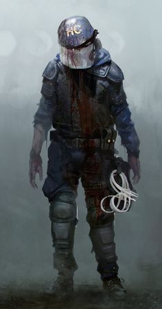 a man with a helmet and goggles walking in the fog