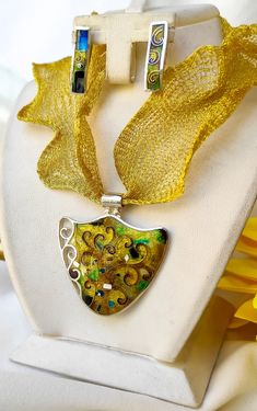 Beautiful and Stylish Jewelry Set. Cloisonne enamel base on 999 Silver. Pendant weight : 15.4g Pendant size: 4.5cm x 4.3cm Earring weight : 2.8 gr (for one piece ) Earring size: length 2.2 cm x 0.6 cm 👉 Please write your phone number, it is necessary for shipping!! 🎁 The item comes with gift box Please feel free to contact me. Me and My Husband have beautiful workroom-shop BAKMY in the center of Tbilisi (Georgia) You can see more works here----> Instagram: https://www.instagram.com/bakmyenamel/ Facebook: https://www.facebook.com/bakmyenamel Klimt Tree Of Life, Cloisonne Enamel Jewelry, Unusual Necklace, Golden Tree, Earrings Golden, Tbilisi Georgia, Cloisonne Enamel, Tree Of Life Pendant, Enamels