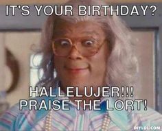 an old woman with glasses and a birthday card saying it's your birthday?