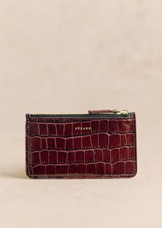 Item made in our Spanish workshop;Exterior with embossed croc-effect smooth leather;Cotton lining;Zip fastening;Cardholder compartments. - Zipped pocket.;Weight: 50 g / 1.7 oz;Dimensions: 8.5 x 14 x 1 cm / 3.1 x 5.5 x 0.4 in