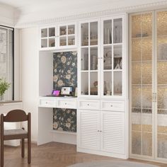 a white desk and chair in front of a window with flowers on the wall behind it