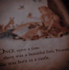 an open book with the words once upon a time there was a beautiful little princess she was born in a castle